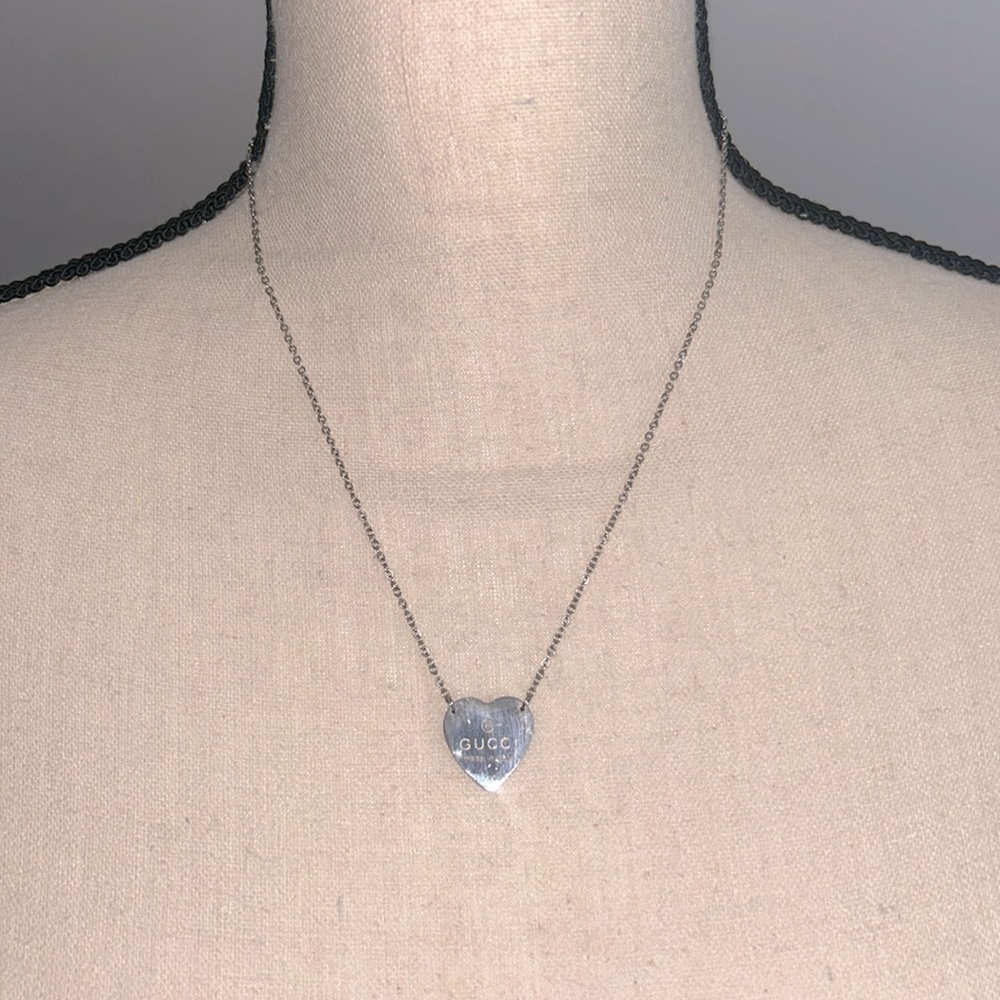 Gucci heart necklace.